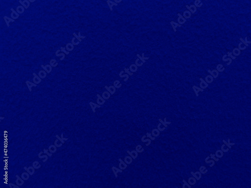 Felt blue soft rough textile material background texture close up,poker table,tennis ball,table cloth. Empty blue fabric background..