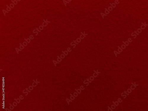 Felt red soft rough textile material background texture close up,poker table,tennis ball,table cloth. Empty red fabric background..