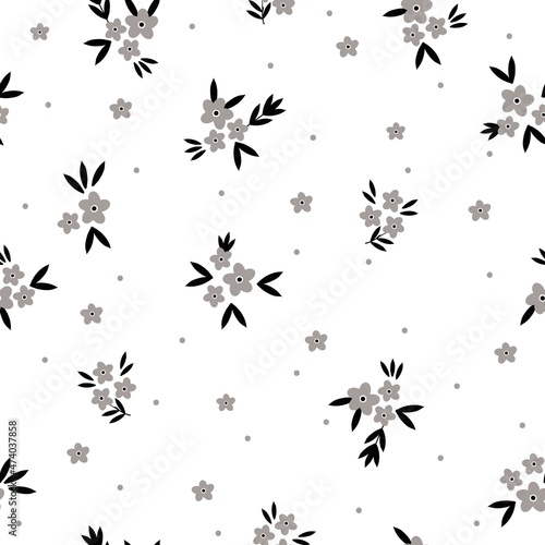 Vintage pattern. Small gray flowers and dots  black leaves. white background. Seamless vector template for design and fashion prints.