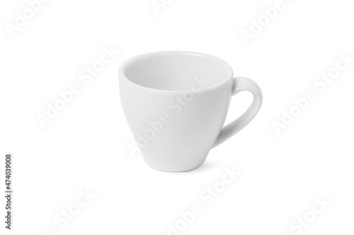 White cup isolated on white background. Ceramic coffee cup or tea mug for drink close up. Mock up classic porcelain utensils.