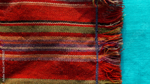 Fotografie Ancient homespun fabric. Russian style. Ethnic style.