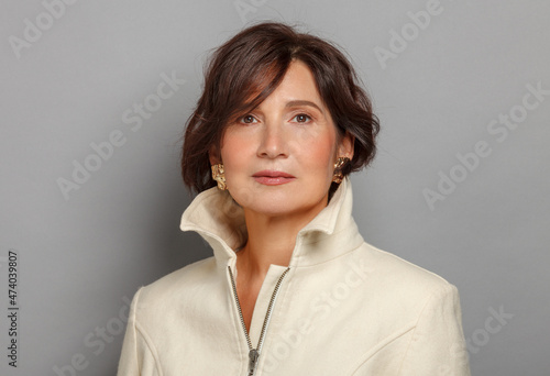 Mature and gorgeous woman portrait. Headshot of a beautiful and respectable 50-60 years woman