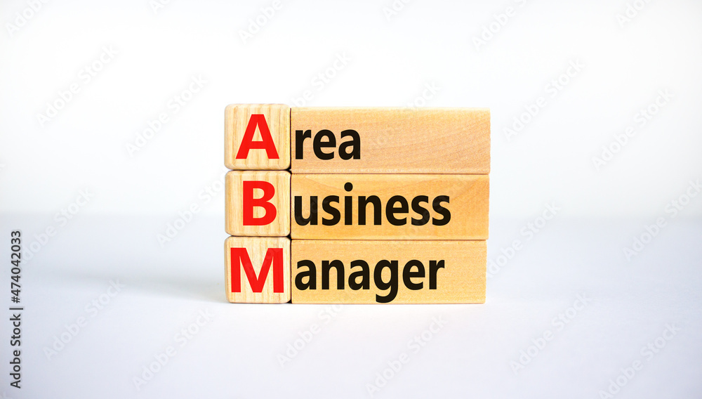 ABM area business manager symbol. Concept words ABM area business manager on wooden blocks. Beautiful white background, copy space. Business and ABM area business manager concept. ABM area business manager symbol. Concept words ABM area business manager on wooden blocks. Beautiful white background, copy space. Business and ABM area business manager concept.