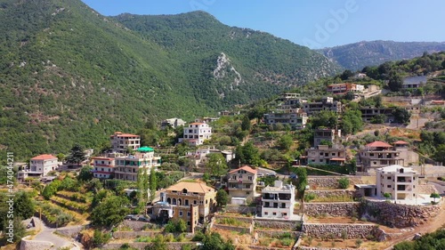 Aerial Residential Built Structures On Mountain Landscape, Drone Flying On Sunny Day - Yahchouch, Lebanon photo