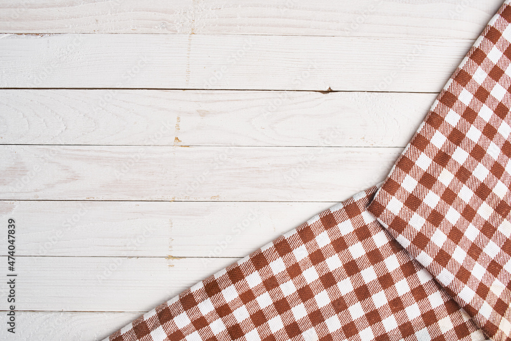 Obraz premium plaid tablecloth wooden texture kitchen decoration design