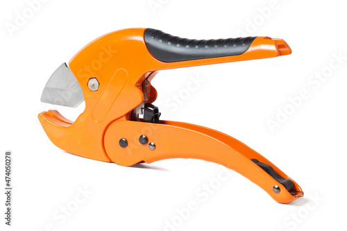 orange scissors for cutting propylene pipes insulated