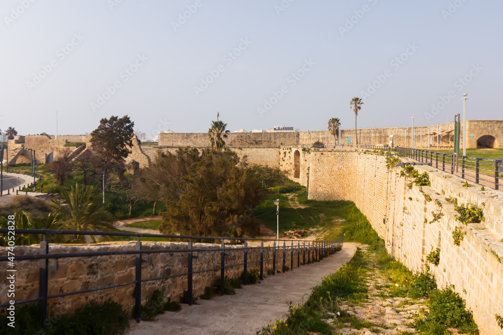 The fortified wall of the Akko fortress with a turret