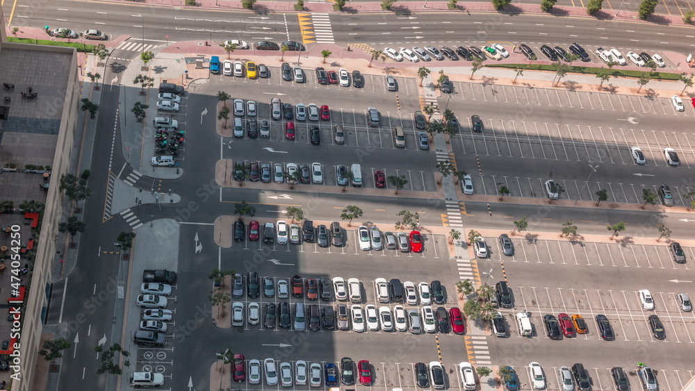 Aerial view of a parking lot with many cars in rows timelapse Aerial view of a parking lot with many cars in rows timelapse
