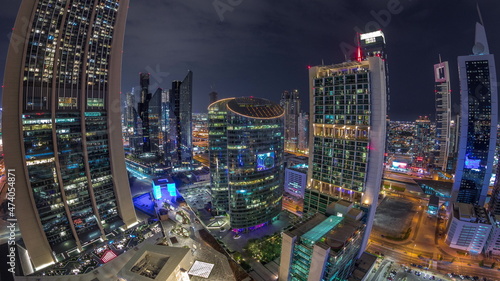 Dubai international financial center skyscrapers aerial night timelapse.