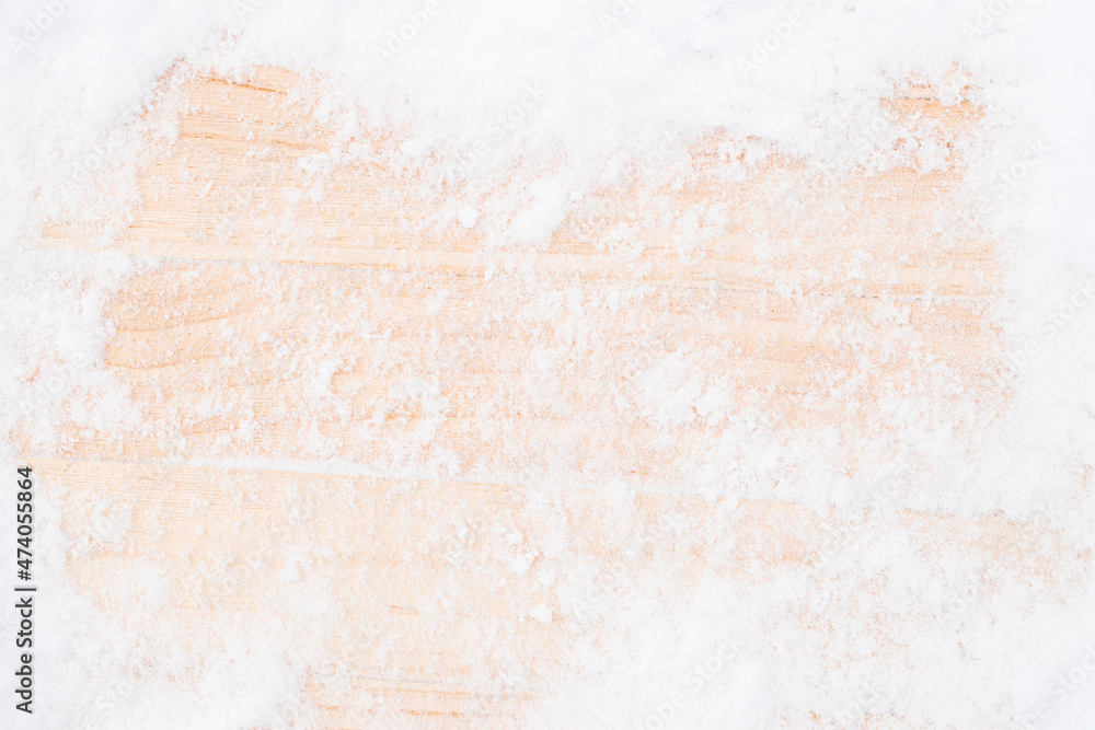Table snow. Winter wooden texture background. Christmas board with old rustic wood wall, white frozen ice. Merry Christmas holiday card pattern. Table snow. Winter wooden texture background. Christmas board with old rustic wood wall, white frozen ice. Merry Christmas holiday card pattern.