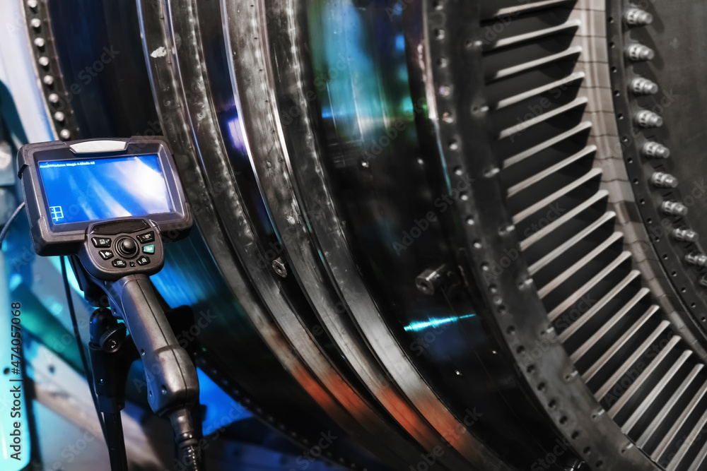custom made wallpaper toronto digitalBorescope camera display on a tripod located at the turbine, Inspection of internal parts of a jet engine.
