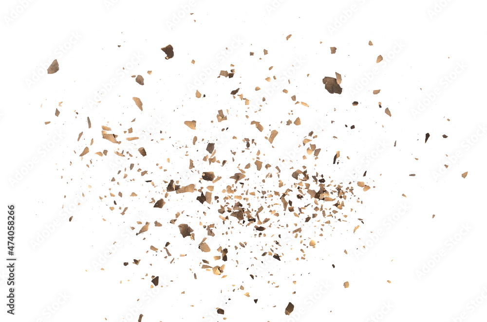 Fototapeta premium Ash with burned, cardboard scraps scattered, pieces explosion effect isolated on white background, texture, top view