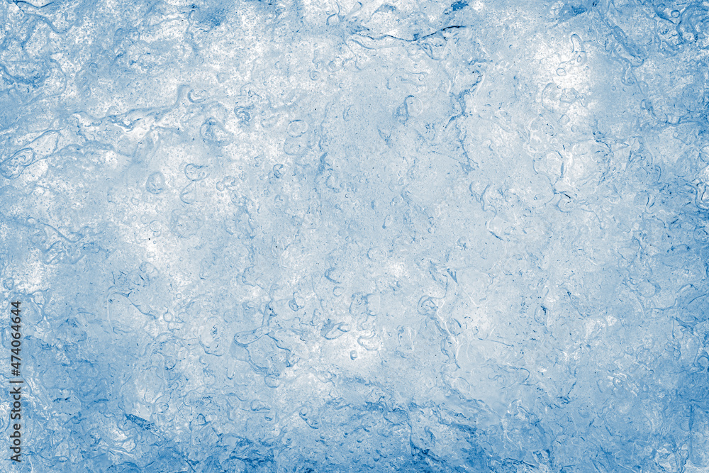Ice texture background. The textured cold frosty surface of crushed ice.
