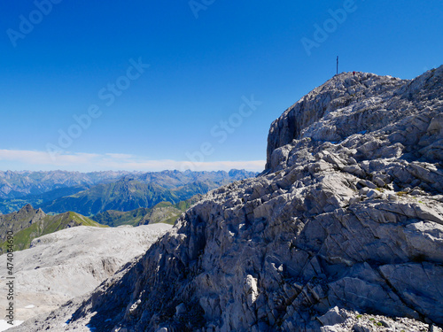 Summit cross of Sulzfluh, Raetikon on a sunny day. Vorarlberg, Austria. photo
