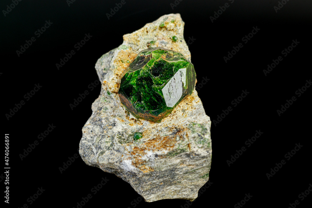 macro mineral stone Andradite on a black background macro mineral stone Andradite on a black background