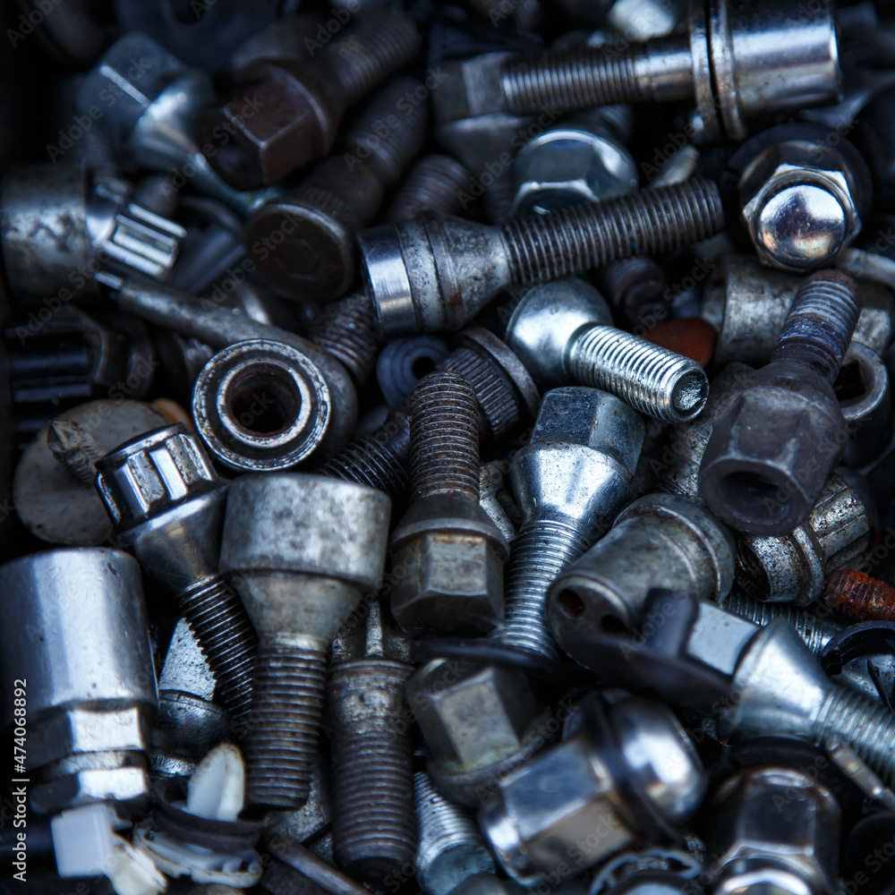 metallic texture with different black or shiny screw background metallic texture with different black or shiny screw background