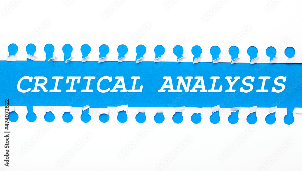 On a gray background, a white calculator, a pen, banknotes and a sheet of paper under a black paper clip with the text LINE OF CREDIT. Business concept