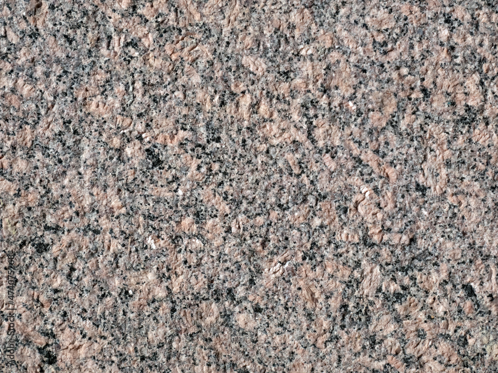 Gray with pink granite texture closeup Gray with pink granite texture closeup