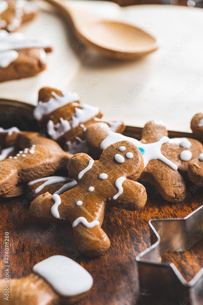 Homemade sweet christmas gingerbread cookies and cookbook.
