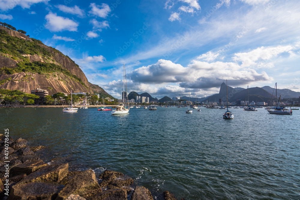 Rio de Janeiro, Brazil, July 2021 - View of Urca neighborhood and Christ the Redeemer statue in the distance