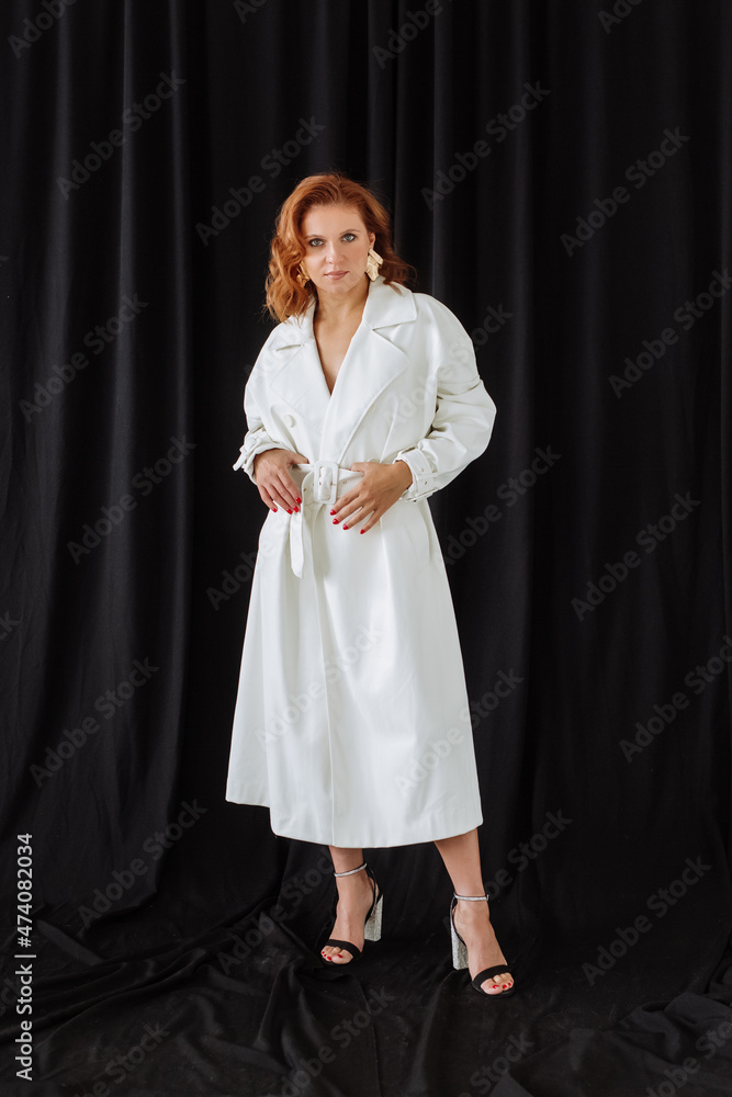 A Woman in white coat and hat, minimalist photo