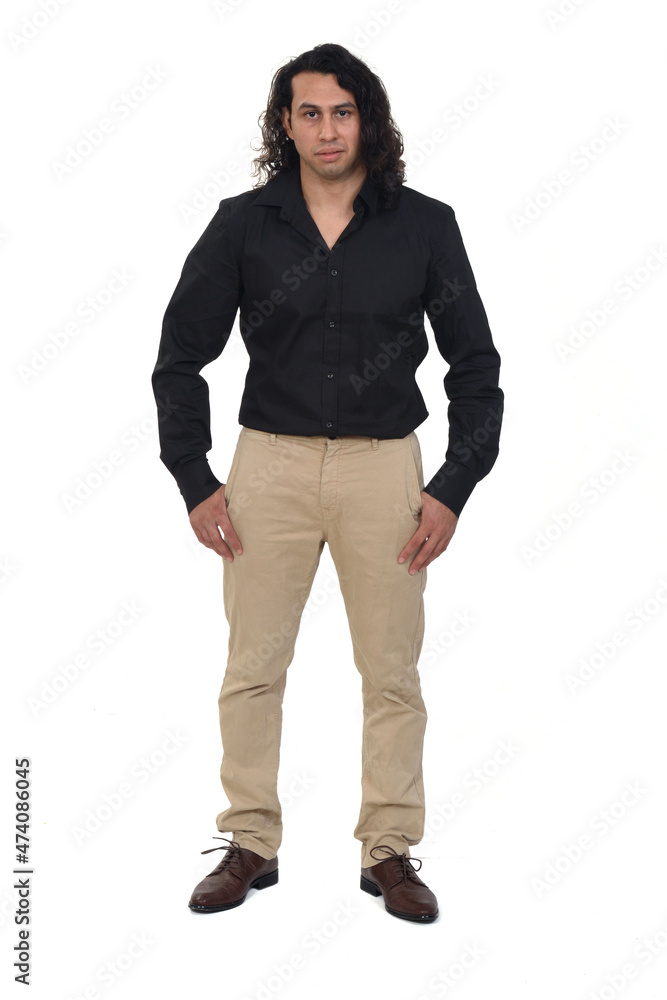 front view of a man with long hair , hands on pocket on white background front view of a man with long hair , hands on pocket on white background