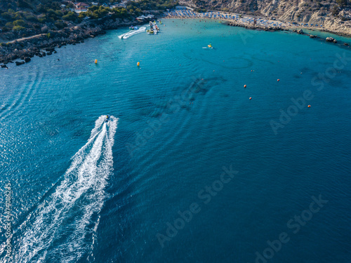 Aerial view on jet ski in azure water of a sea