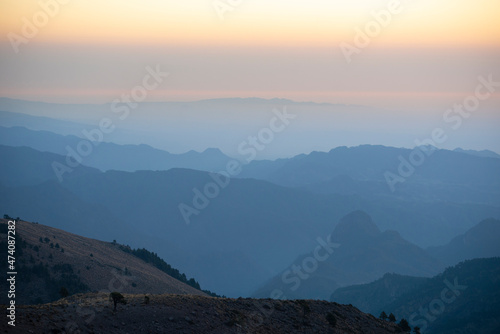 Layer of mountains seen from Pico de Orizaba base camp at sunset photo