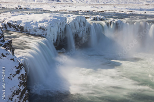 frozen waterfall from aerial view named Godafoss © Cavan