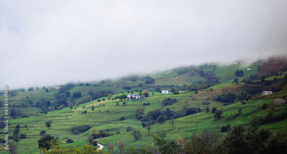 Fototapeta premium Cantabrian hills and rural landscape of farmland. Valleys pasiegos in nothern Spain.