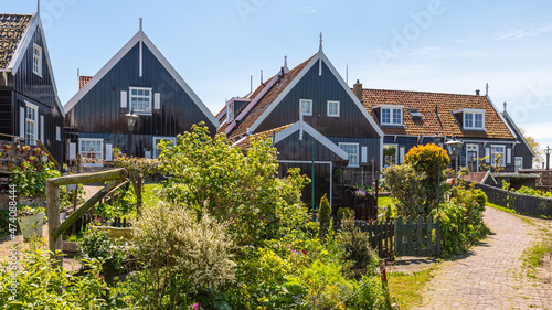 Traditional wooden houses in the picturesque fishing village of Marken on the former island on the Markermeer.