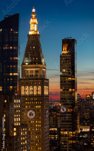 Sunset over Lower Manhattan and the Met-Life clock tower , New York City