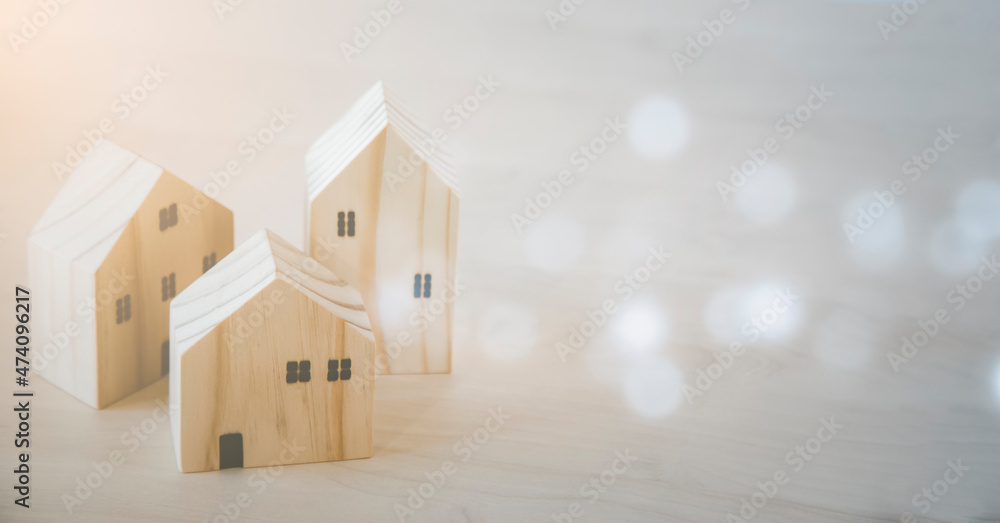 Mini wood house model from model on wood table, Planning buy Real Estate, Planning to buy property and Choose the best. work from home and stay at home concept. Mini wood house model from model on wood table, Planning buy Real Estate, Planning to buy property and Choose the best. work from home and stay at home concept.