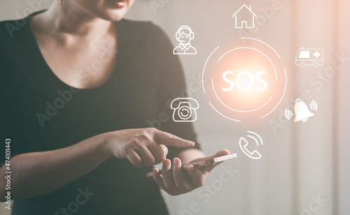 Quadro su tela Woman using Smart Phone with Emergency app in home, call phone, Chat message icon, Emergency application from smartphone for elderly, technology concept