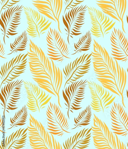 seamless pattern with warm coloured autumn leaves on light blue fresh background
