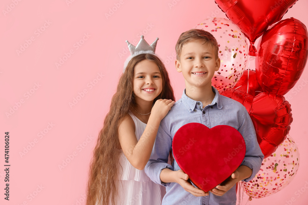 Happy children with gift and balloons on color background. Valentine's Day celebration Happy children with gift and balloons on color background. Valentine's Day celebration