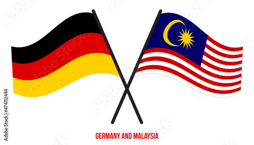 Germany and Malaysia Flags Crossed And Waving Flat Style. Official Proportion. Correct Colors.