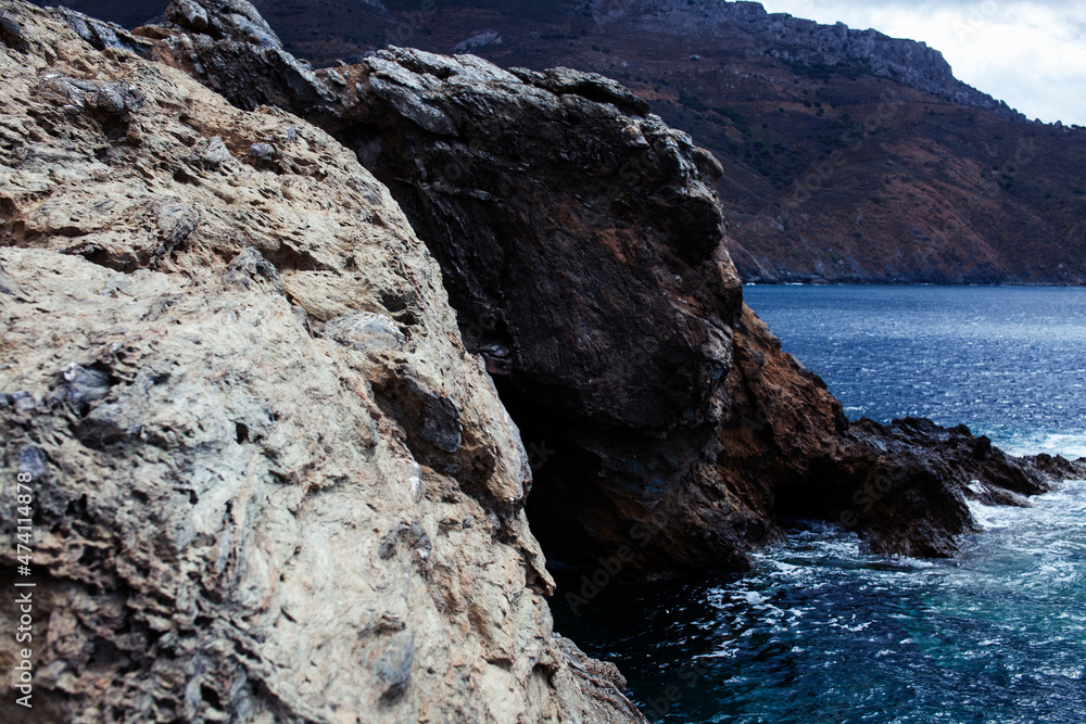 Beautiful wild landscape: seashore with rocks and clear water Beautiful wild landscape: seashore with rocks and clear water