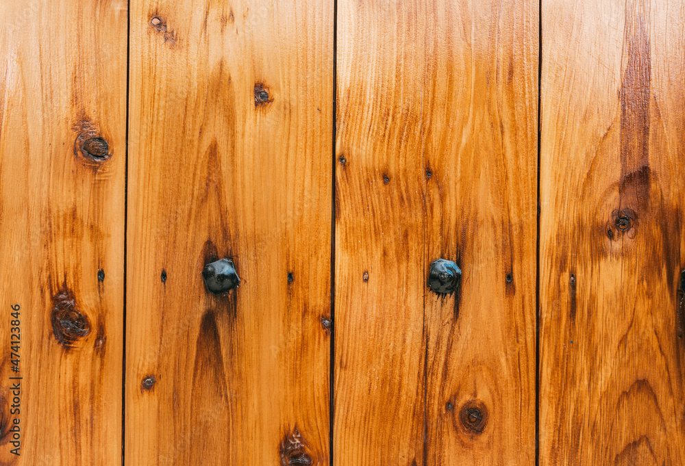 Detail and texture of wooden boards of a door. Detail and texture of wooden boards of a door.