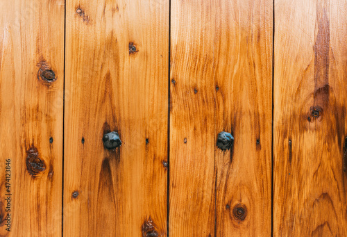 Detail and texture of wooden boards of a door.
