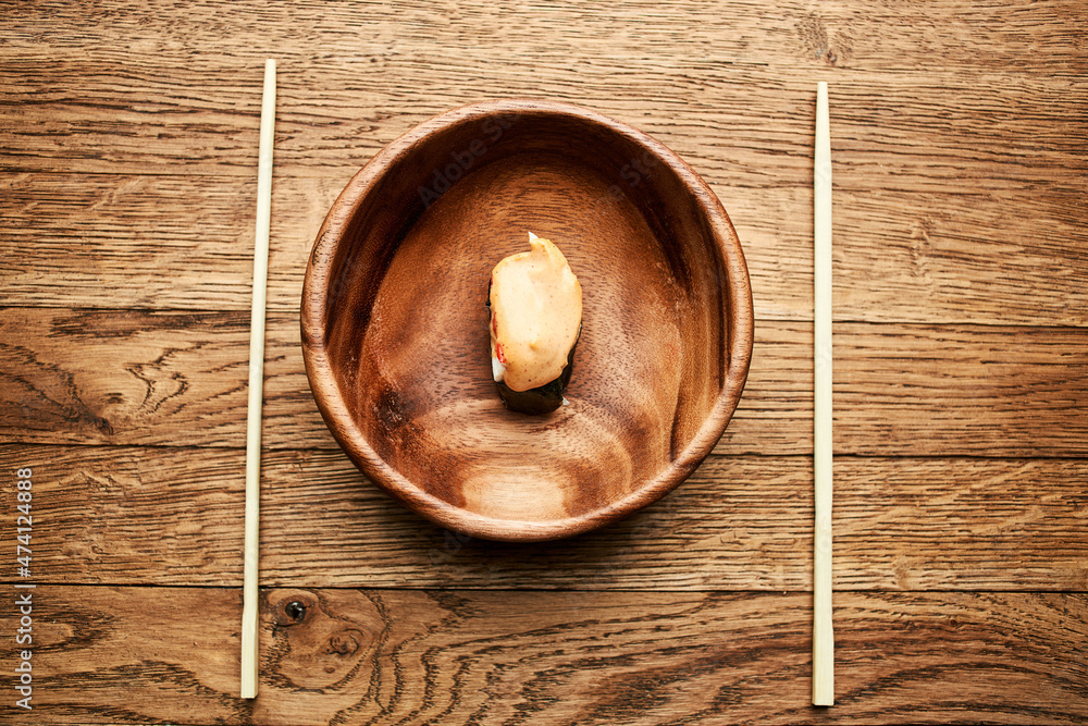 sushi on wooden plates chopsticks Japanese cuisine Asia Fish sushi on wooden plates chopsticks Japanese cuisine Asia Fish