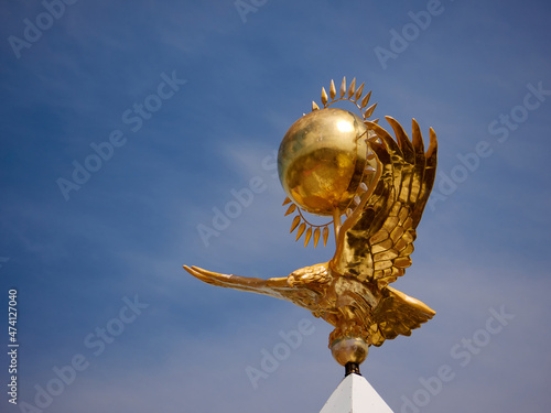 eagle and sun- symbol of Kazakhstan in Karaganda city photo