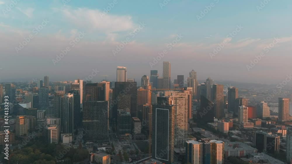 Wide establishing aerial over Seattle's South Lake Union featuring the city's skyline at sunset. Wide establishing aerial over Seattle's South Lake Union featuring the city's skyline at sunset.