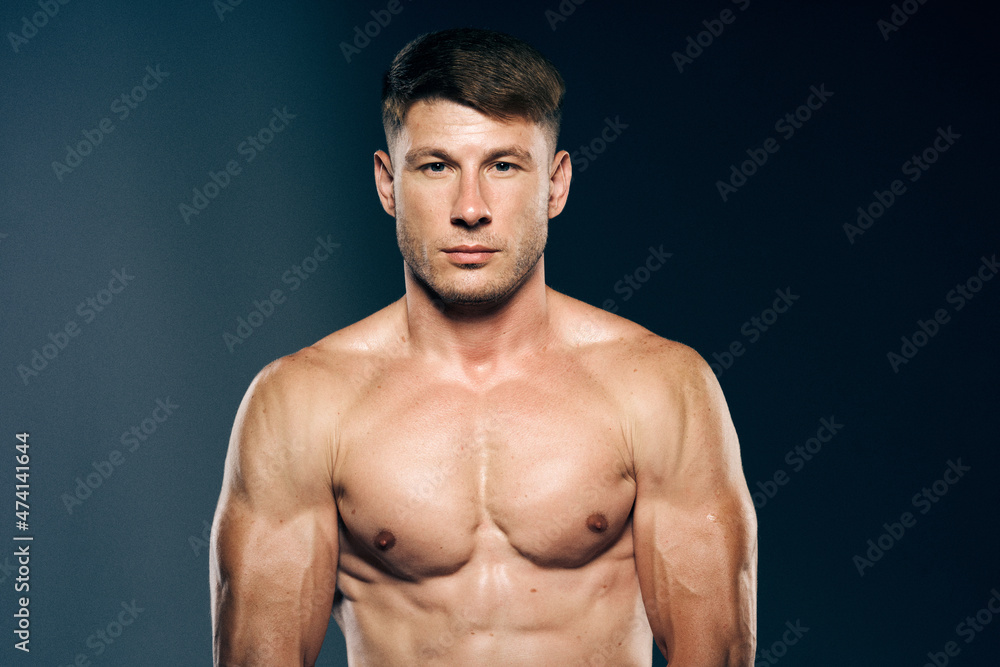 athletic male topless workout muscle bodybuilder dark background athletic male topless workout muscle bodybuilder dark background