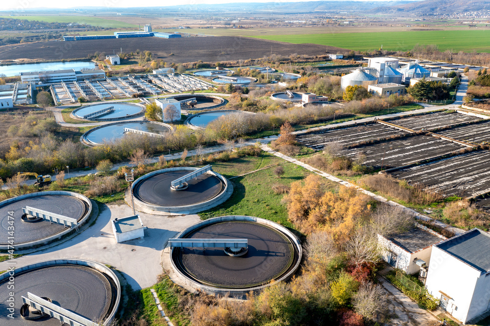 Aerial top view of a city sewage treatment plant.