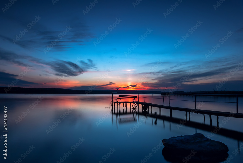 blue hour. Stunning long exposure sunset on the lake.