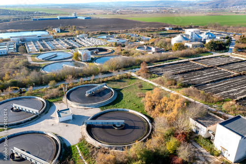 Aerial top view of a city sewage treatment plant.