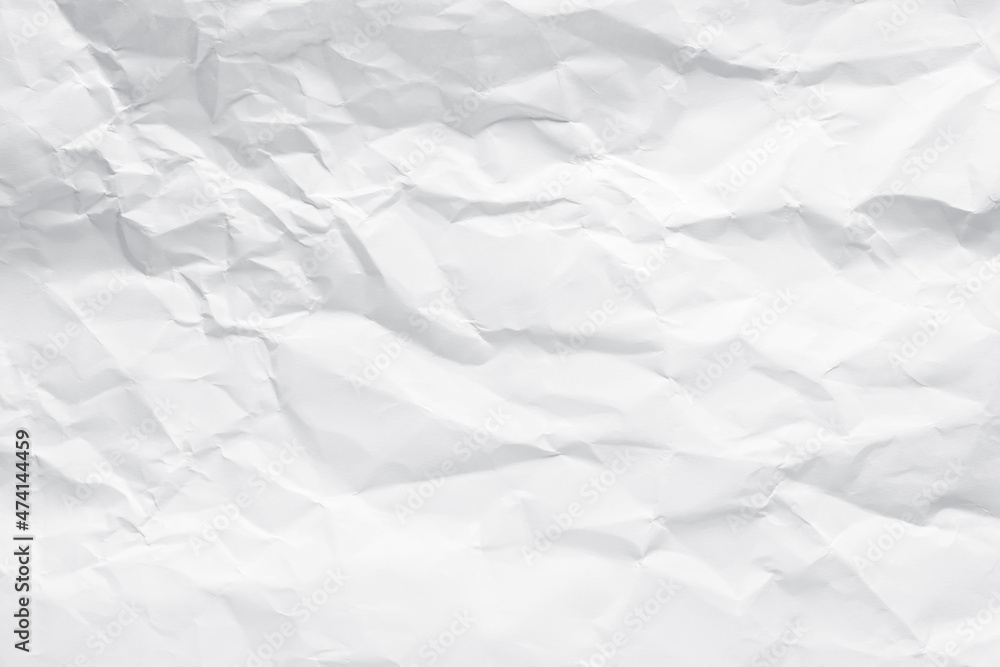 Obraz premium White crumpled paper texture background.