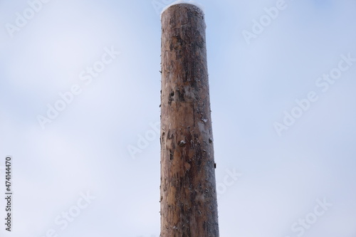 wooden pillar against the sky