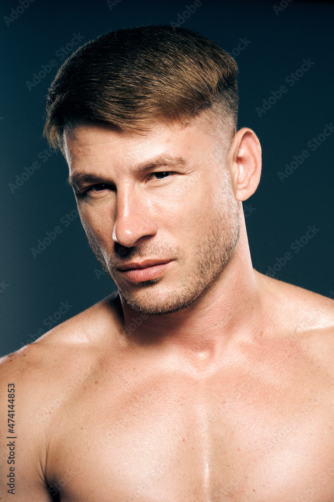 athletic male topless workout muscle bodybuilder dark background athletic male topless workout muscle bodybuilder dark background